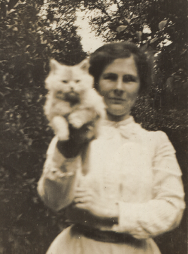 With her cat, 1912