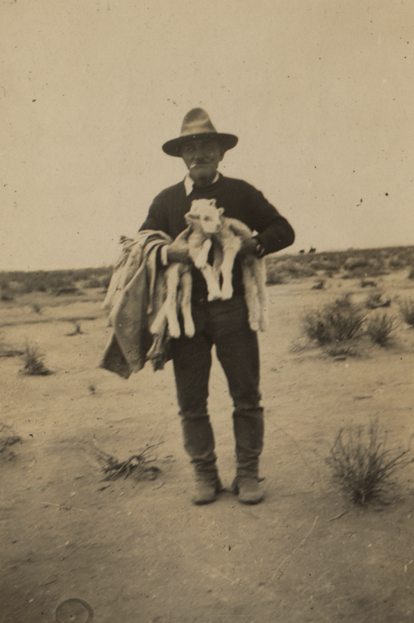 Aubrey Hall with two lambs ArchivesWiki