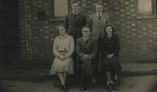 Insurance company staff photo (Ralph is top left)